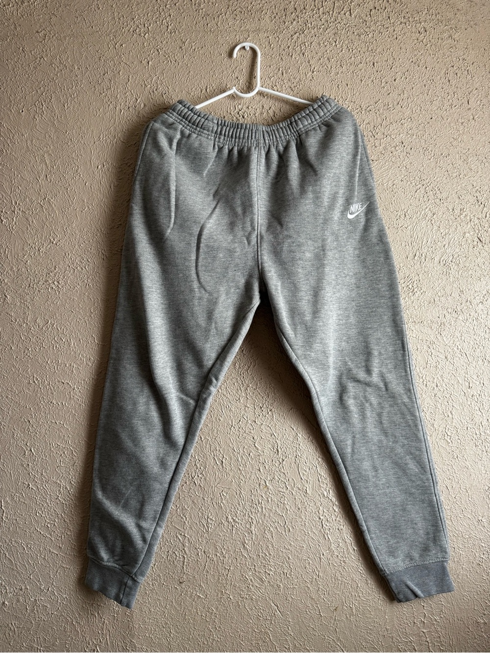 Nike woman’s Heather Gray Jogger Sweatpants with White Logo